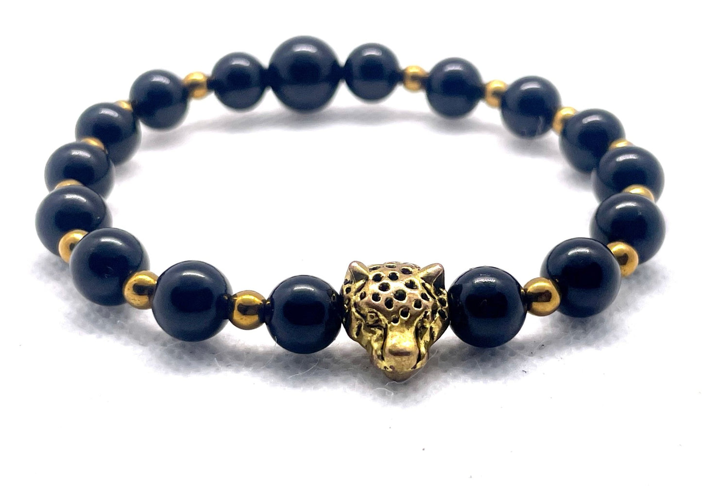 "Savage Opulence: Black Onyx & Hematite Jaguar Power Bracelet" - Organicmansion.com