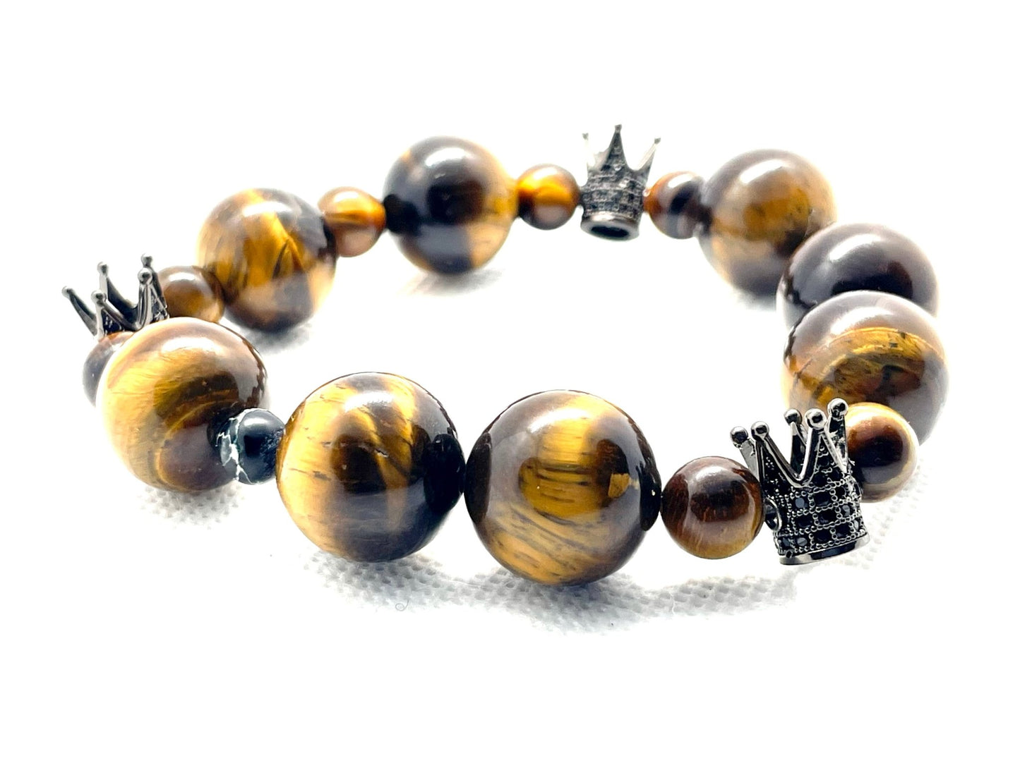 Triple Crown Triumph: Tiger's Eye Bracelet with Regal Symbolism - Organicmansion.com