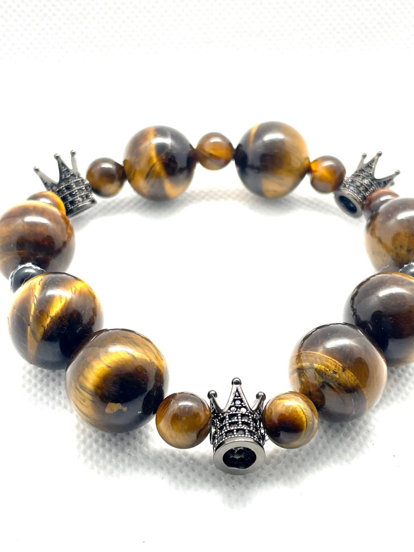 Triple Crown Triumph: Tiger's Eye Bracelet with Regal Symbolism - Organicmansion.com
